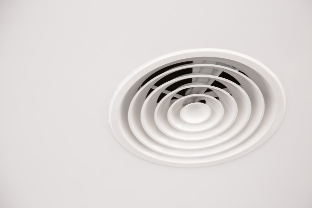 White ceiling air duct with dust in the bathroom Premium Photo